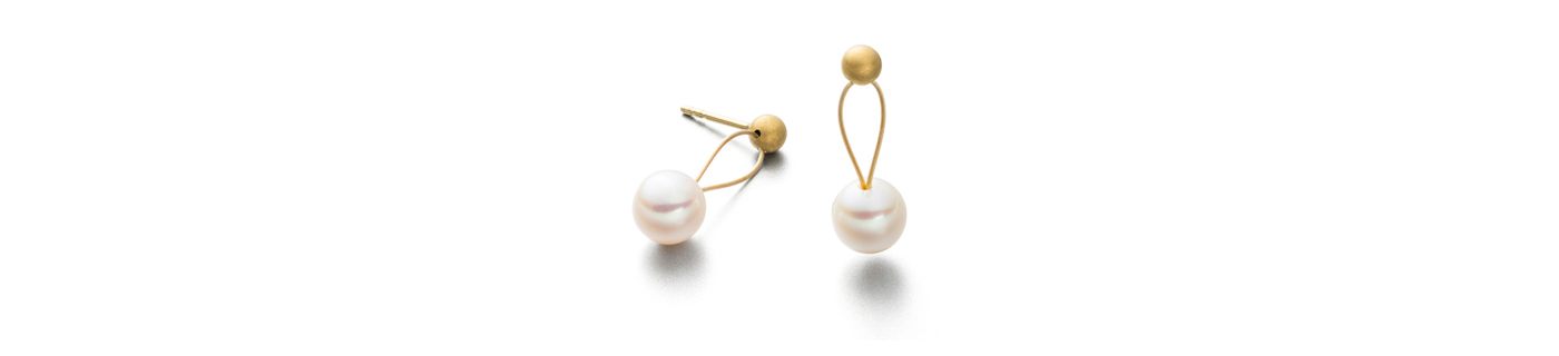 Perlen-Ohrschmuck am Ohr anschmiegsam